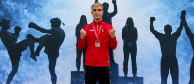 DEVREKLİ MUAY THAİ SPORCUSU  ABDULLAH TIĞ’DAN BRONZ MADALYA